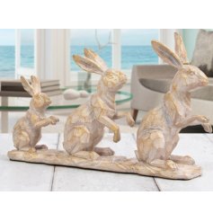A Super Adorable Driftwood Ornament of Hares
