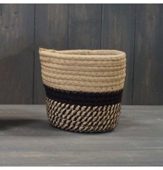 A Small Neutral And Black Basket