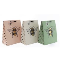 A mix of three fine quality gift bags in an assortment of pastel colours. Complete with  luxury bee illustration and tag