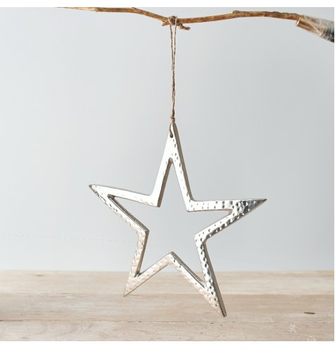 A chic star decoration with hammered detailing and a jute string hanger.