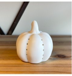 A Small Ceramic Pumpkin In A Matte White Finish