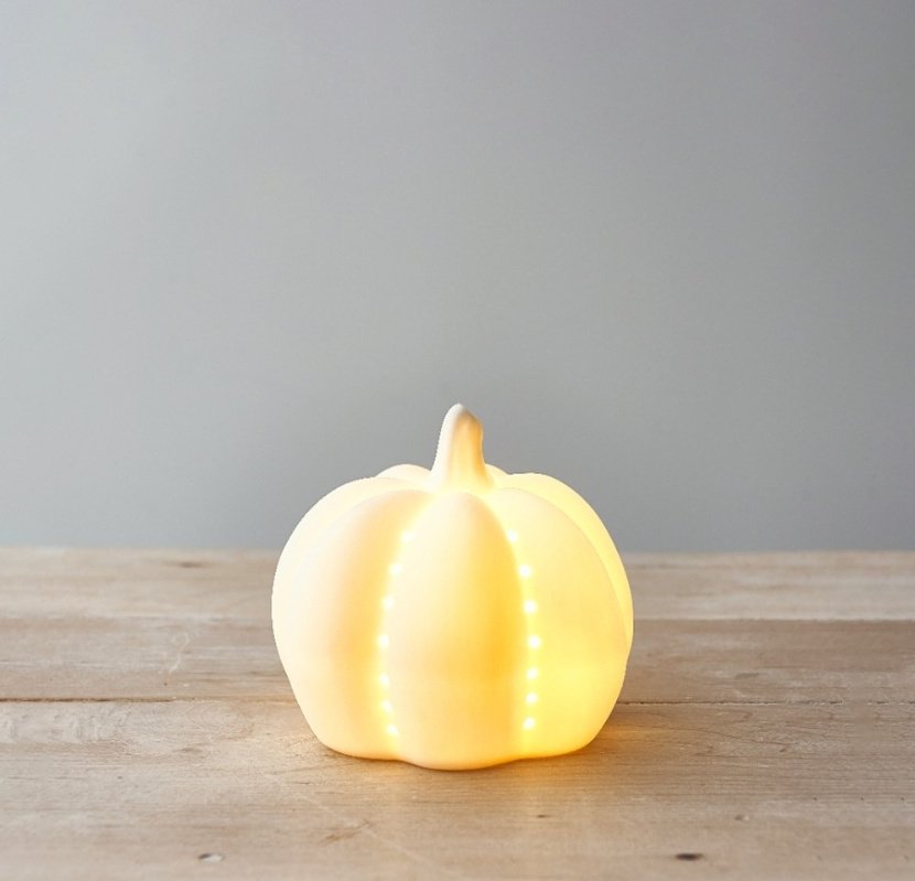 A Small Ceramic Pumpkin In A Matte White Finish