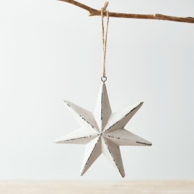 A Small Rustic Hanging Star Decoration