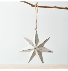 A Small Rustic Hanging Star Decoration