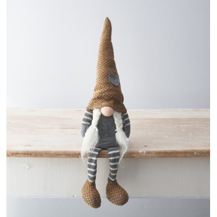 A chic and unique shelf sitting gonk decoration. A Scandinavian style gonk with plaits and knitted hat. 