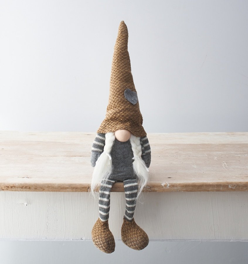 A chic and unique shelf sitting gonk decoration. A Scandinavian style gonk with plaits and knitted hat. 