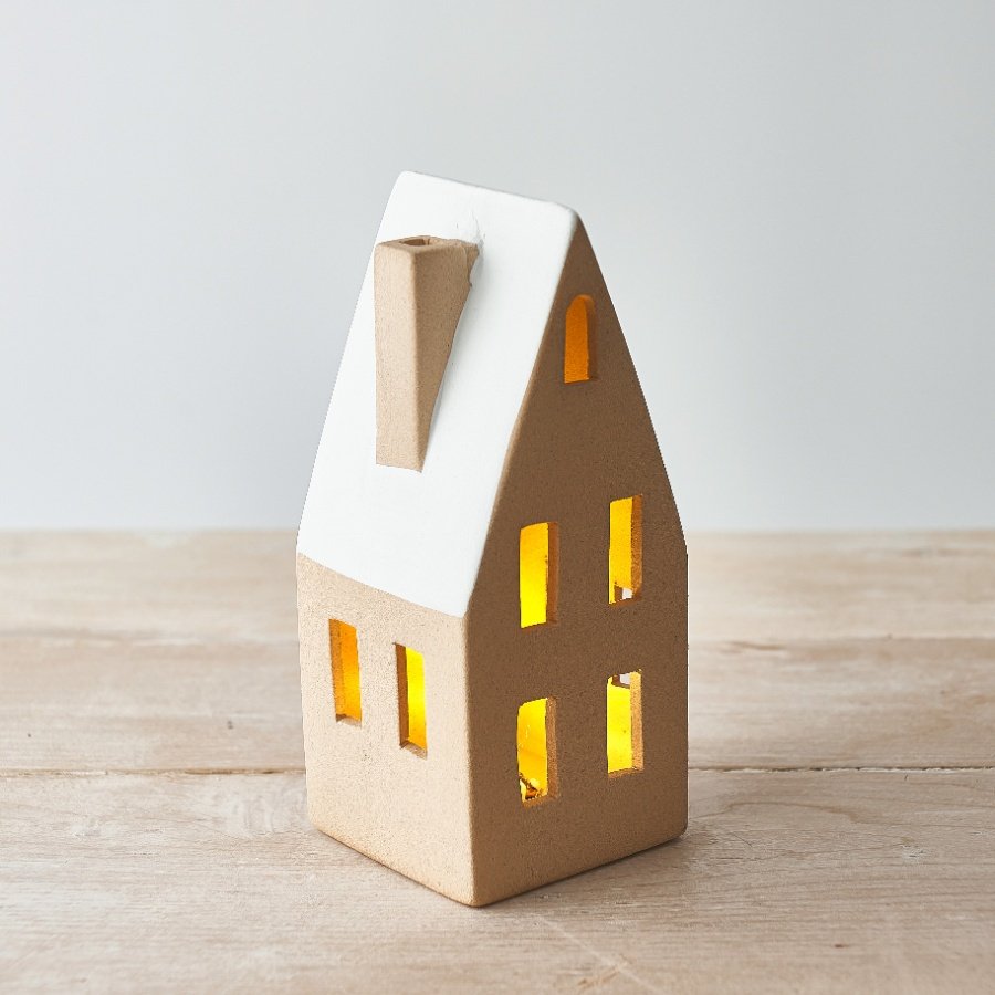 A Small Ceramic House Ornament