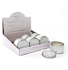 An attractive candle tin with apple and ginger snap scented candle. 