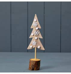 A chic felt Christmas tree set upon a natural bark base. Decorated with snowflakes and pom poms. 