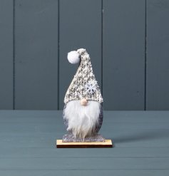 A cute and unique standing Gonk decoration. Complete with faux fur beard and a snowflake hat. 
