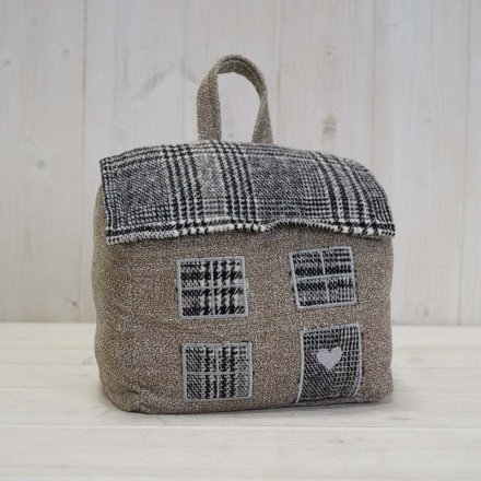A charming country cottage fabric doorstop with carry handle. A cute stitched doorstop with tartan fabric