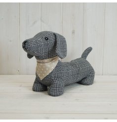A rustic dog doorstop in a chic grey check design. Complete with a polka dot bandana. 