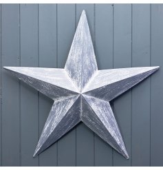 A large rustic metal star decoration