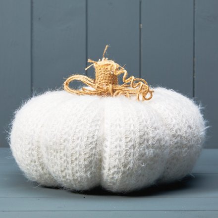 A chic white knitted pumpkin decoration with a rustic hessian stalk. 