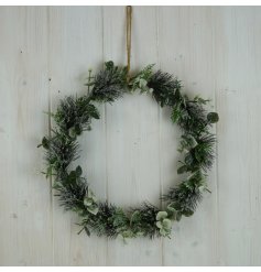 A classic foliage wreath with a frosted finish. 