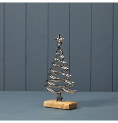 A festive decoration featuring a silver christmas tree