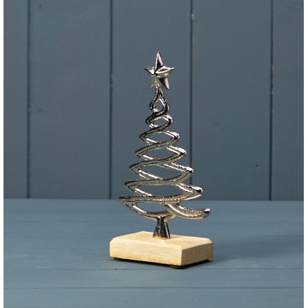 Silver Tree Ornament On Wooden Base