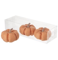 A charming set of 3 orange linen pumpkins