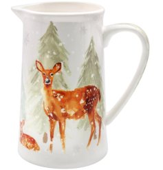 A gift boxed Ceramic jug featuring illustration of a deer and fawn