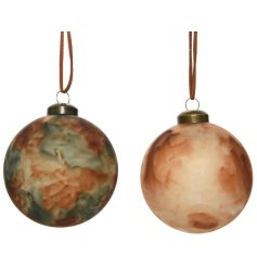 A mix of 2 stylish baubles with a mottled pattern in moss green and brown cinnamon hues.