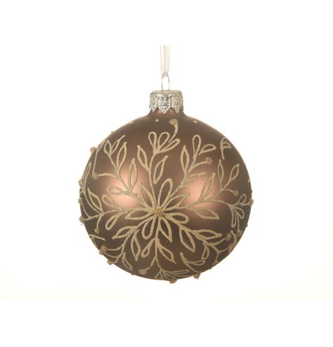 A luxurious glass bauble in a rich walnut colour. Decorated with an ornate glitter snowflake design. 