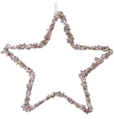 A chic iron star decorated with sparkling silver spangles.