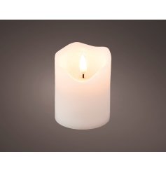 A charming flickering flame pilar candle