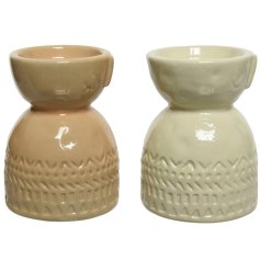 A boho styled assortment of 2 ceramic t-light holders