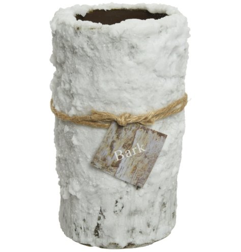 A unique bark Christmas pillar candle with a snow frosted finish. A stylish gift item and interior accessory.