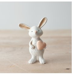 A super cute ornament featuring a white rabbit