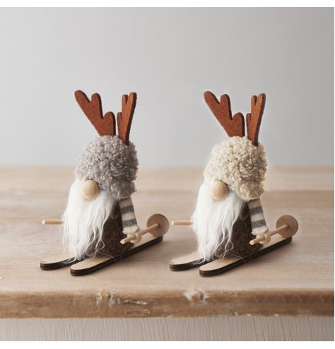 A cute woodland gonk in cream and brown colours. Complete with wooden skis and felt antlers. 