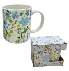 A charming Julie Dodsworth porcelain mug 