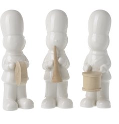 A charming assortment of 3 white porcelain figures