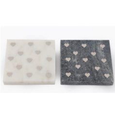 A sleek and chic assortment of 2, set of 4 marble coasters