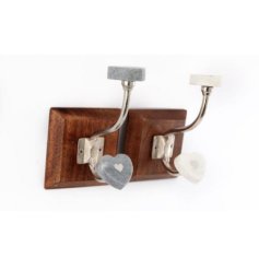 A sweet assortment of 2 wooden door hooks