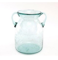 A simplistic clear blue vase