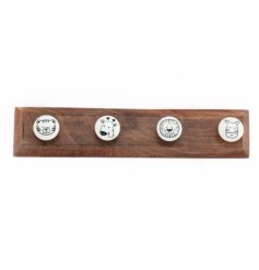 A charming wooden plaque featuring safari themed hooks