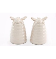 A charming set of white salt and pepper pots