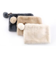 A faux fur assortment of 3 make up bags