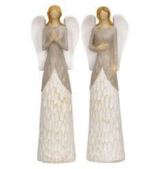 A rough luxe inspired assortment of 2 standing angel decorations