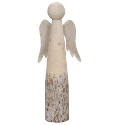 A distressed looking wooden angel decoration