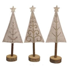 A charming assortment of 3 neutral tree standing decorations