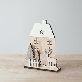 A charming wooden house decoration featuring cut out windows