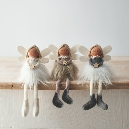 A charming assortment of 3 fabric angels