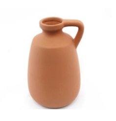 A smooth finished terracotta coloured vase