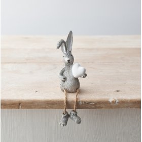 A charming sitting rabbit figure in grey