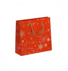 A festive styled small gift bag in red