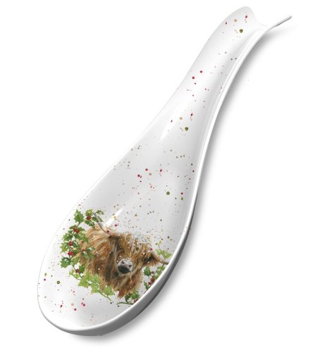 A festive spoon rest with a charming highland cow illustration.