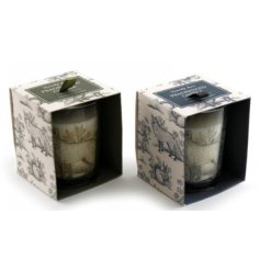 An assortment of 2 beautifully scented and packaged glass candle pots.
