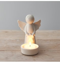 A charming candle holder in white
